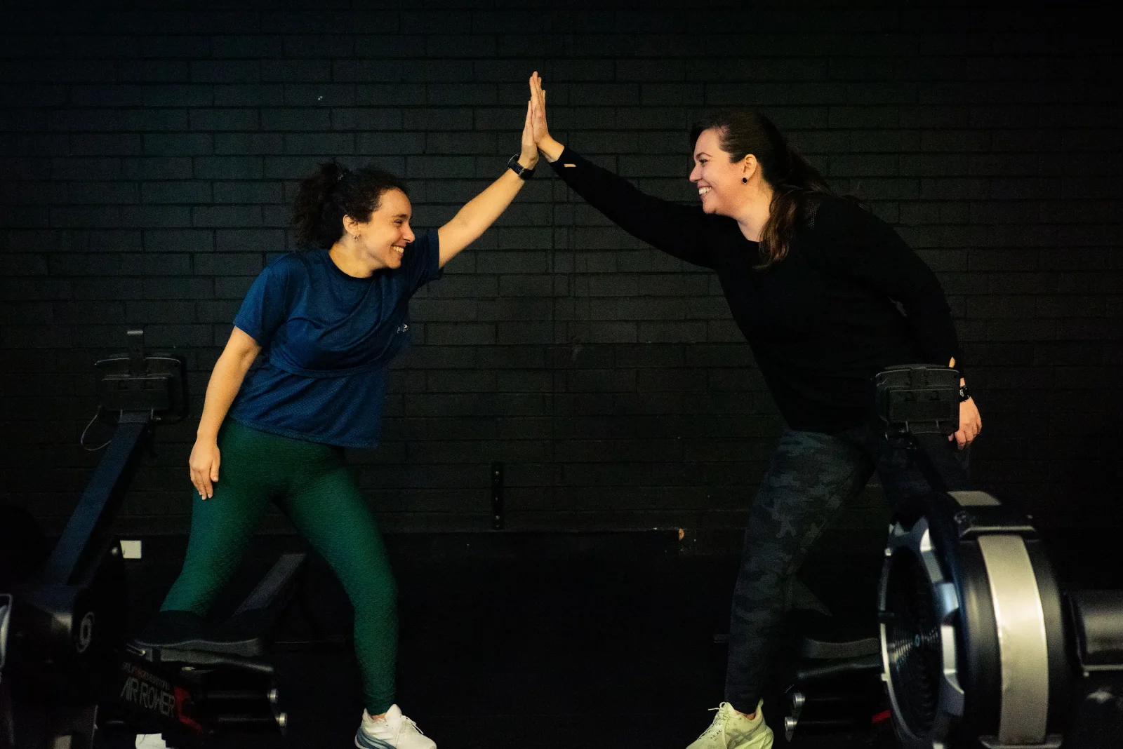 Hudson clients celebrating progress after a gym effort