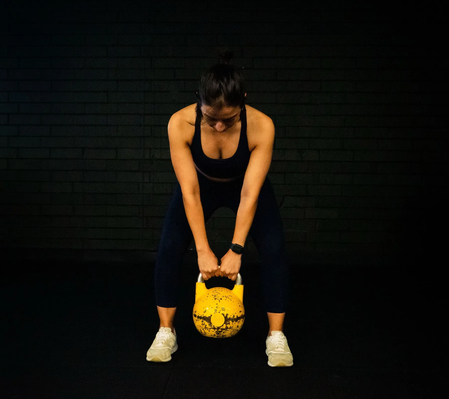 Client performing a kettlebell deadlift setup