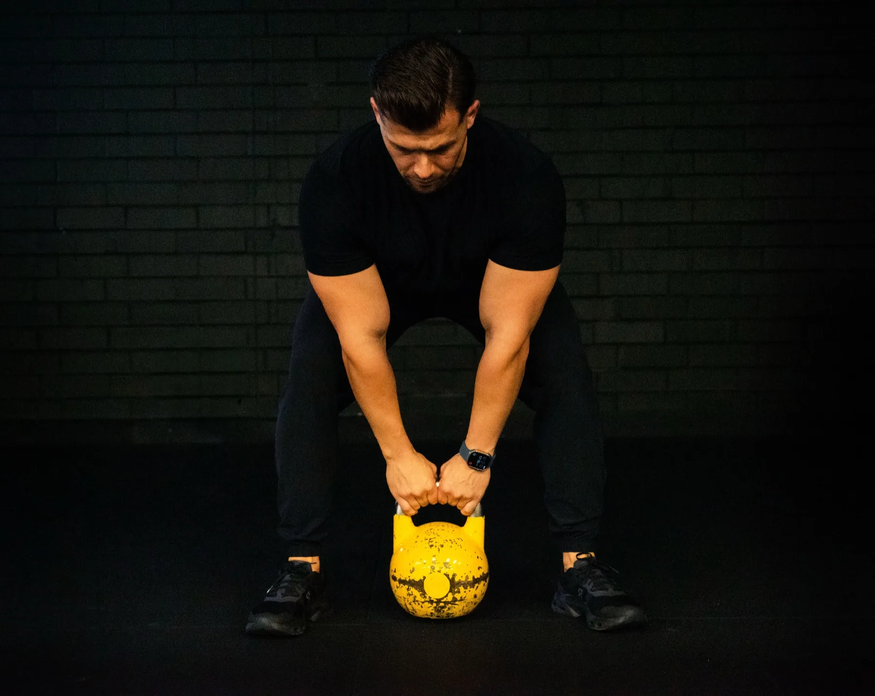 Hudson demonstrating a kettlebell deadlift setup