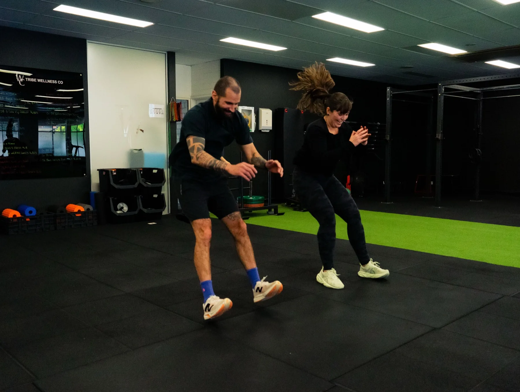 Clients performing jump squat conditioning in the gym