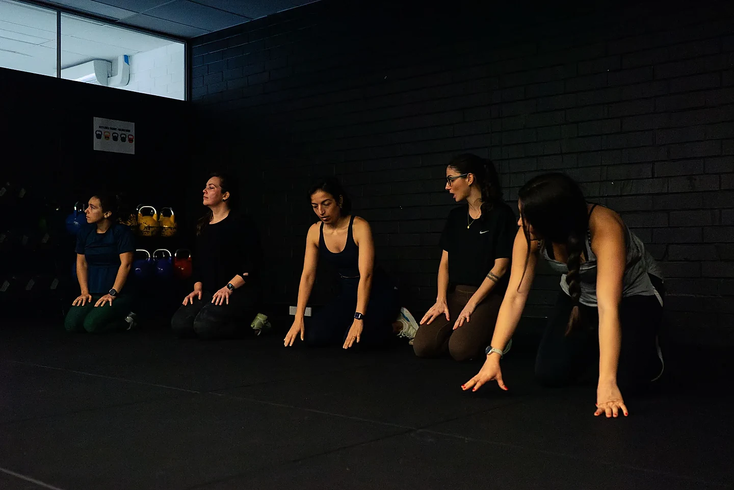 Hudson clients moving through gym mobility work